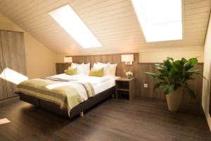 Ένα ή περισσότερα κρεβάτια σε δωμάτιο στο Hotel Amaris