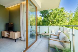 Balkón alebo terasa v ubytovaní Unique View Apartment - 3pok, 4 łóżka, widok na rzekę, centrum, Netflix, parking, winda
