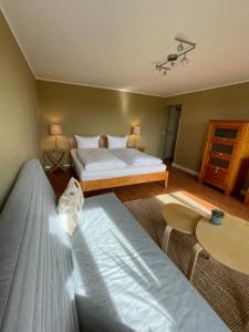 Letto o letti in una camera di Waldgasthaus Balsamine