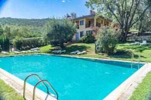 Bazén v ubytovaní Hotel Rural Xerete alebo v jeho blízkosti