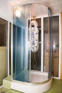 a shower in a room with aurity at Hotel Deva in Sandanski