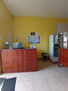 Kuchyň nebo kuchyňský kout v ubytování Hostel Sol da Barra