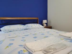 Кровать или кровати в номере Hotel Dika