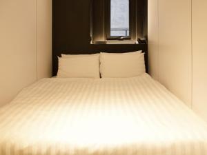 Katil atau katil-katil dalam bilik di Hotel Relax III