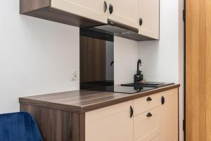 Kuchyňa alebo kuchynka v ubytovaní NovaNest Apartments - Kalwaryjska - by Upstairs