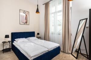 Posteľ alebo postele v izbe v ubytovaní NovaNest Apartments - Kalwaryjska - by Upstairs