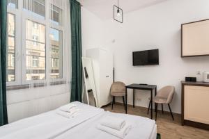 Posteľ alebo postele v izbe v ubytovaní NovaNest Apartments - Kalwaryjska - by Upstairs