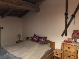 Łóżko lub łóżka w pokoju w obiekcie Le domaine des Terres