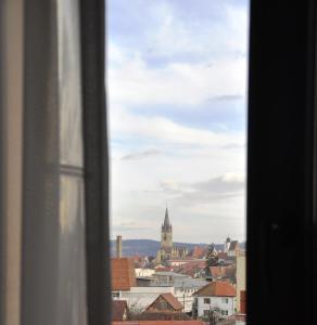 Nespecifikovaný výhled na destinaci Sibiu nebo výhled na město při pohledu z hotelu