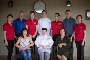 a group of people are posing for a picture at Ryan's Hotel in Cong