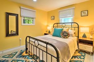 a bedroom with a bed and a mirror at Game Room, Community Beach Pocono Home! in Albrightsville