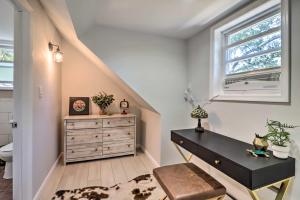 a bathroom with a dresser and a window at Game Room, Community Beach Pocono Home! in Albrightsville