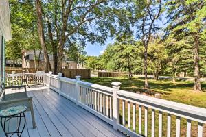 a wooden deck with a bench and trees at Game Room, Community Beach Pocono Home! in Albrightsville