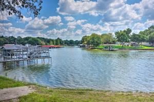 a view of a river with a dock and houses at Gun Barrel City Lake House with Boat Launch and Grill! in Gun Barrel City