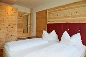 Postel nebo postele na pokoji v ubytování Hotel Residence Olympia