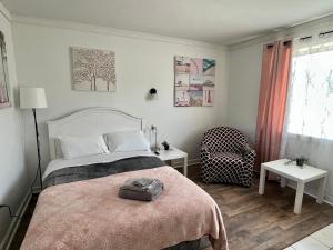 Postel nebo postele na pokoji v ubytování Cobmin Ridge Motel
