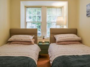 מיטה או מיטות בחדר ב-Ardvar