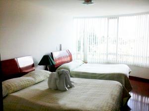 Hotel Santris客房内的一张或多张床位