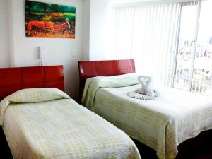 Hotel Santris客房内的一张或多张床位