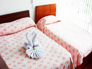 Hotel Santris客房内的一张或多张床位