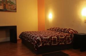 Postel nebo postele na pokoji v ubytování Hotel Alika