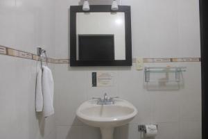 Koupelna v ubytování Hotel Alika