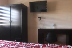 Postel nebo postele na pokoji v ubytování Hotel Alika