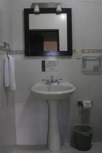 Koupelna v ubytování Hotel Alika