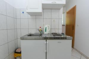 Dapur atau dapur kecil di Apartment Podaca 6677b +13 gambar