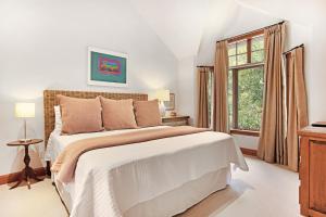 a bedroom with a large bed and a window at 358 Cresta Road in Edwards
