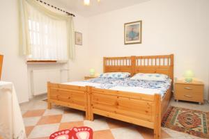 Posteľ alebo postele v izbe v ubytovaní Apartments by the sea Osor, Losinj - 8088