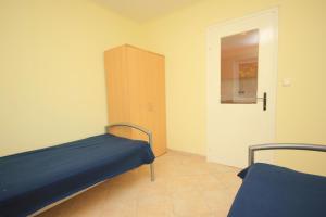 Łóżko lub łóżka w pokoju w obiekcie Apartment Opric 7716b