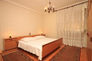 Postel nebo postele na pokoji v ubytování Apartments by the sea Kali, Ugljan - 8203