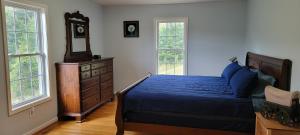 מיטה או מיטות בחדר ב-Mountain Retreat house to Relax and Enjoy