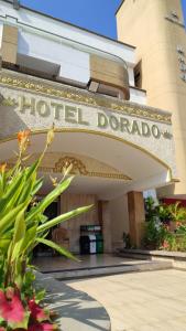 a hotel doododa sign in front of a building at Hotel Dorado Barranquilla in Barranquilla