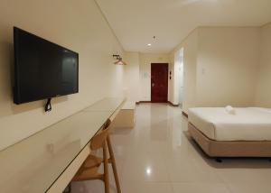 Μια τηλεόραση ή/και κέντρο ψυχαγωγίας στο Kaizen Suites