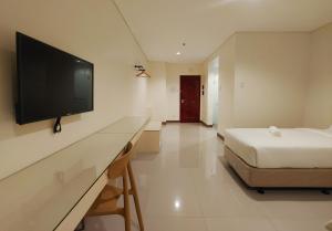 Μια τηλεόραση ή/και κέντρο ψυχαγωγίας στο Kaizen Suites