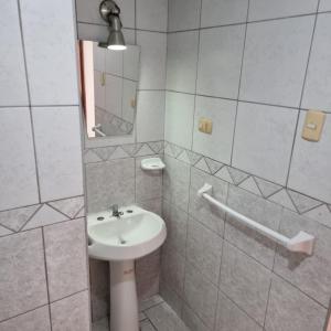 Ванная комната в Apart Hotel Cabral