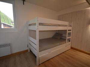 Posteľ alebo postele v izbe v ubytovaní Appartement T4 spacieux à Morzine, 3 chambres, parking, balcons, linge inclus - FR-1-684-3