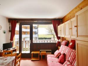 Televízia a/alebo spoločenská miestnosť v ubytovaní Studio 4 pers. avec balcon, près des pistes et du centre, garage, linge inclus, Morzine-Avoriaz - FR-1-684-15