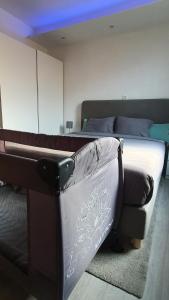 Posezení v ubytování Le Cosy - Queen-size, full équipé, wifi, parking