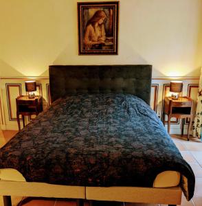 Ένα ή περισσότερα κρεβάτια σε δωμάτιο στο Chambre du Champrenard