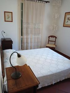 Postel nebo postele na pokoji v ubytování Villetta con giardino a due passi dal mare