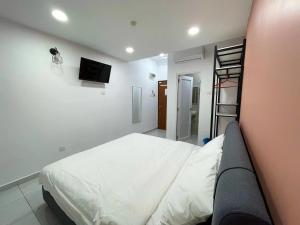 TV a/nebo společenská místnost v ubytování Gemilang Hotel Klang