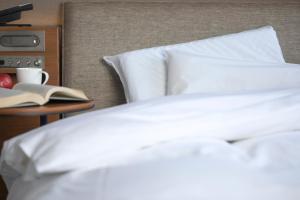 Postel nebo postele na pokoji v ubytování Hotel JAL City Haneda Tokyo