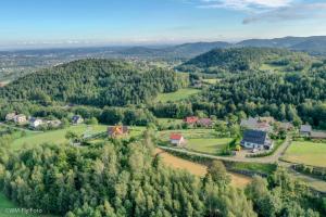 an aerial view of a village in the mountains at JAWORNICA HOUSE domek z pięknym widokiem in Targanice