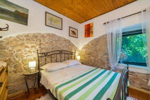 Postel nebo postele na pokoji v ubytování Etno House Wagner
