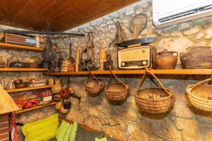 Kuchyň nebo kuchyňský kout v ubytování Etno House Wagner