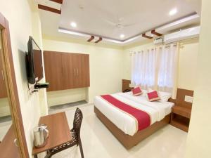 Prabhuvihar Residency客房内的一张或多张床位