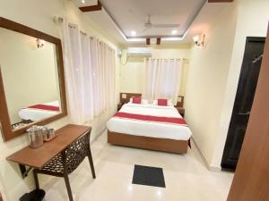 Prabhuvihar Residency客房内的一张或多张床位